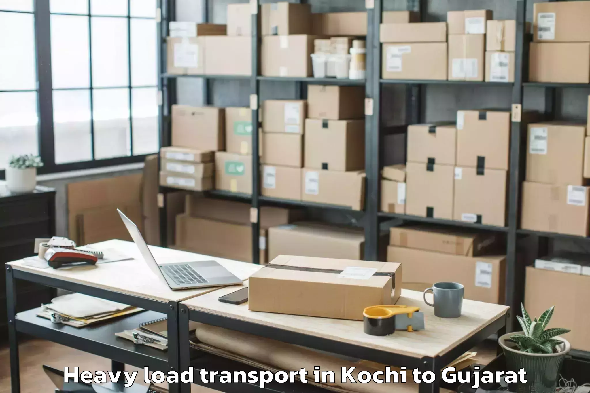 Book Kochi to Jhagadia Heavy Load Transport Online